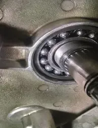 Bearing inspection showing early signs of failure that can mimic imbalance symptoms through abnormal vibrations